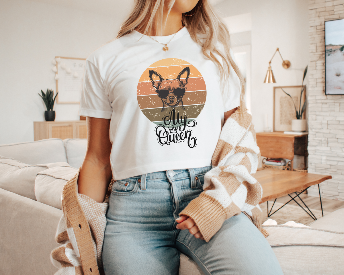 Chihuahua My Queen Women’s crop top is for the fierce, the fabulous, and the dog moms who know their tiny pup rules the world.