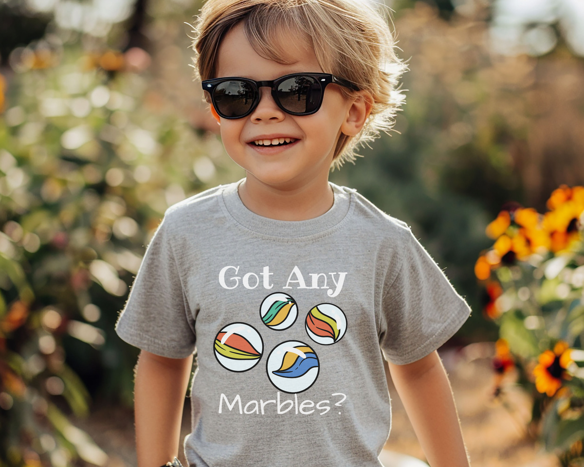 Got Any Marbles Lightweight Kids T-shirt, this tee celebrates a fun and nostalgic hobby that never goes out of style.